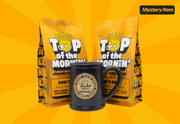two golden bags of coffee one mug and mystery item text by jacksepticeye