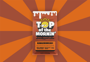 Top of the Mornin' gingerbread flavored coffee package on an orange and brown background