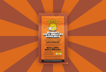 Coffee package with humorous text on an orange and brown striped background