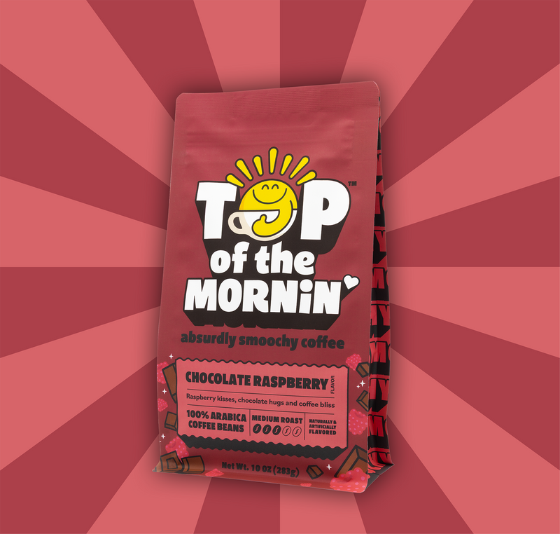 pink and red stripped background top of the mornin coffee absurdly smoochy coffee chocolate raspberry flavored coffee red and pink bag - bag angled