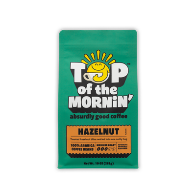 Green coffee bag with 'Top of the Mornin'' branding on a white background