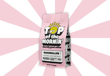 pink marshmallow bag of flavored coffee side pink background