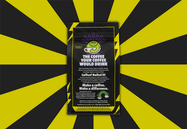 top of the mornin Resurrection roast yellow and black back on top of a yellow and black striped background back view