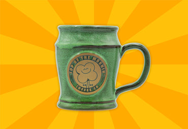 top of the mornin 2025 green mug yellow background front