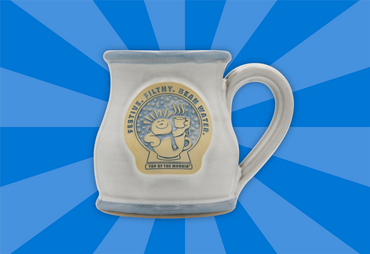 White mug with a gold logo on a blue radial background