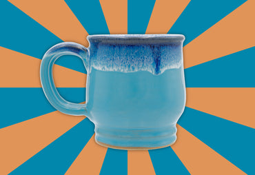 TOTM berry special mug blue mug back of mug blue and orange background